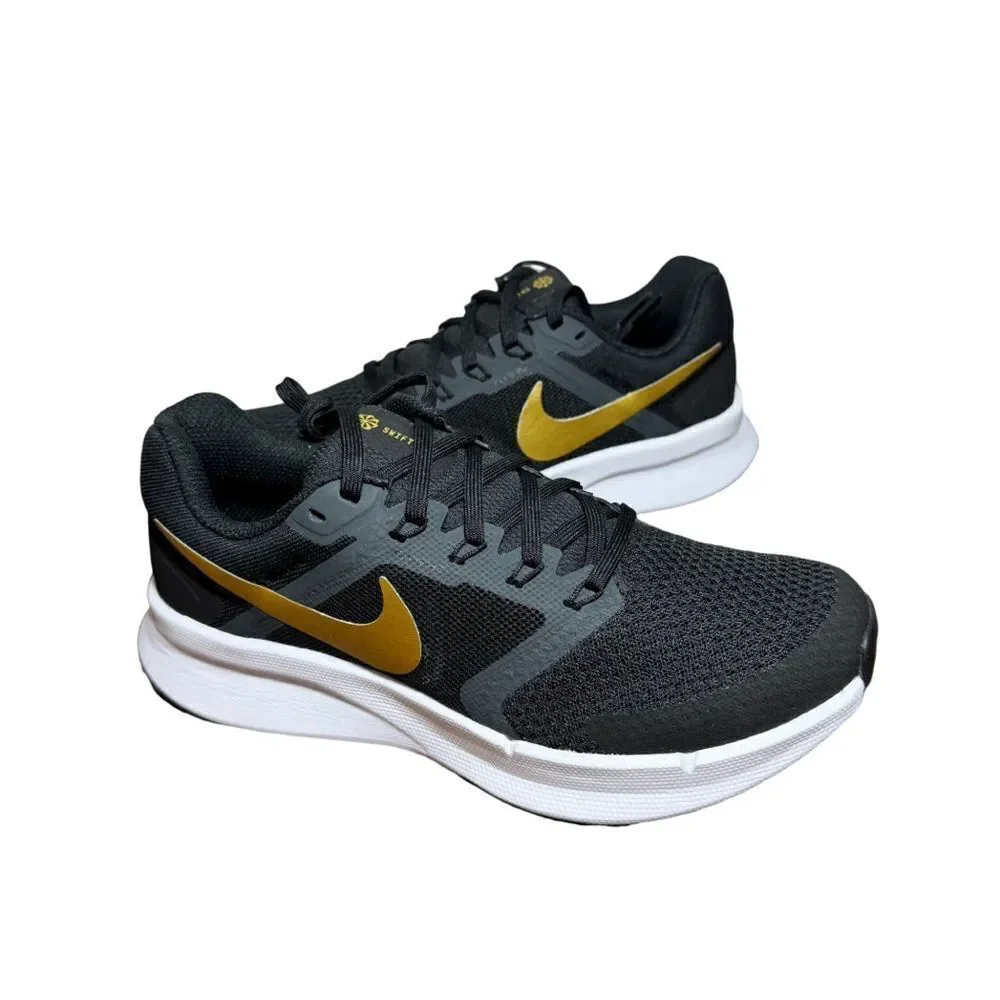 Nike women’s Black and Gold Running Shoes size 6.5